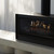 Escea LE1000 40-Inch Freestanding Electric Fireplace | Individually crafted, then cast and hand-painted with meticulous detail, each log rests on a bed of glowing embers illuminated by LED lights that synchronise perfectly with the flame pattern.