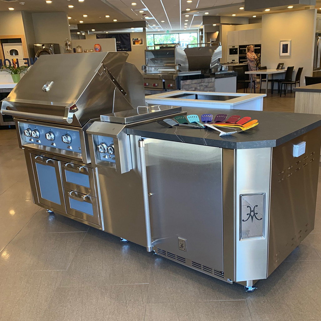 Hestan 24" Solid Door Undercounter Refrigerator | Adjustable, full-extension pullout shelves accommodate everything from platters to bottles.