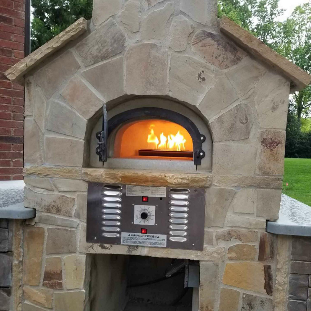 Chicago Brick Oven 750 Hybrid Pizza Oven | High-performance outdoor pizza ovens sourced and made in the USA to ensure safe and reliable year-round cooking.