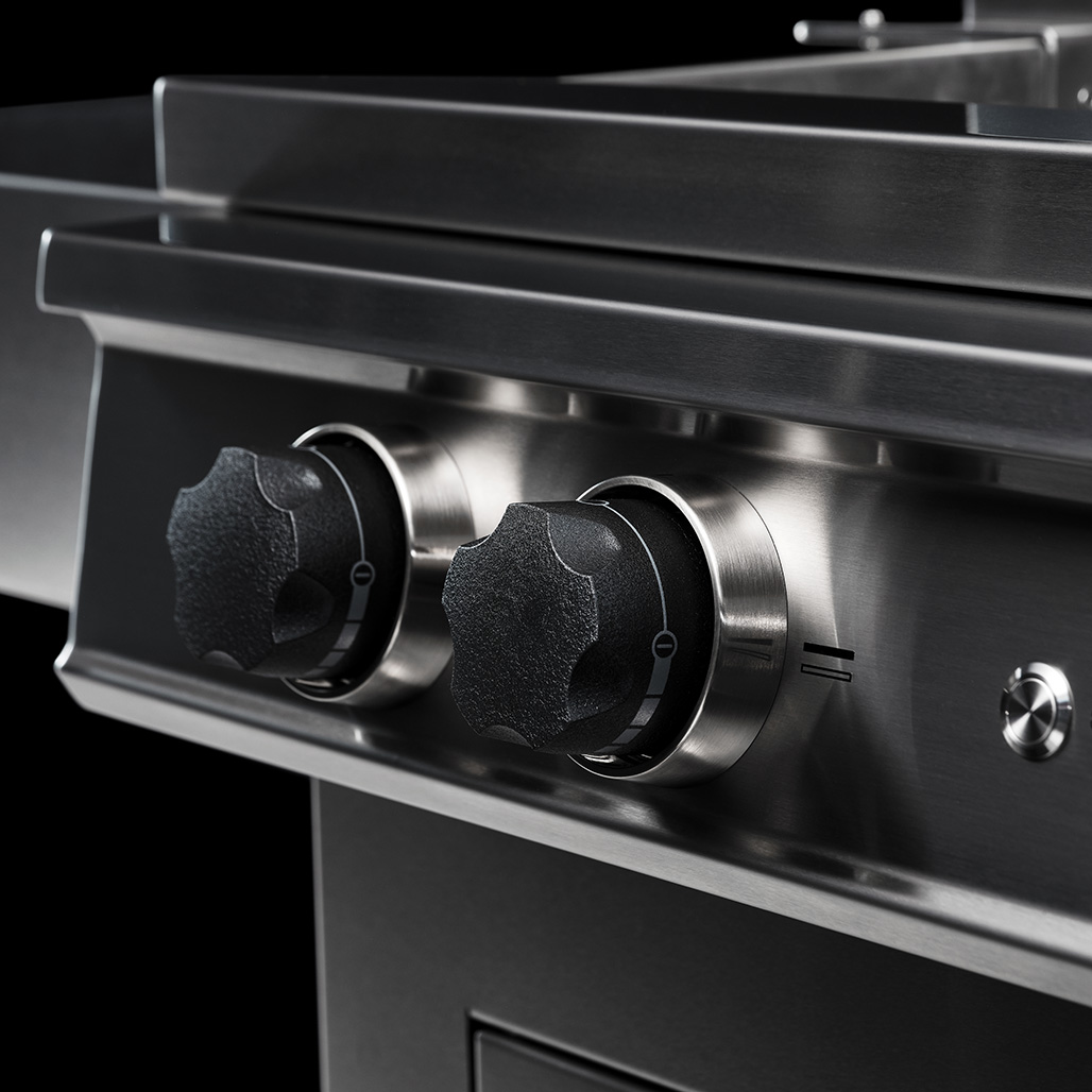 Kalamazoo K750 Gaucho Freestanding Wood-Fired Grill with Side Burner | Two high-powered gas burners, 24,000 BTUs each, quickly light a wood or charcoal fire