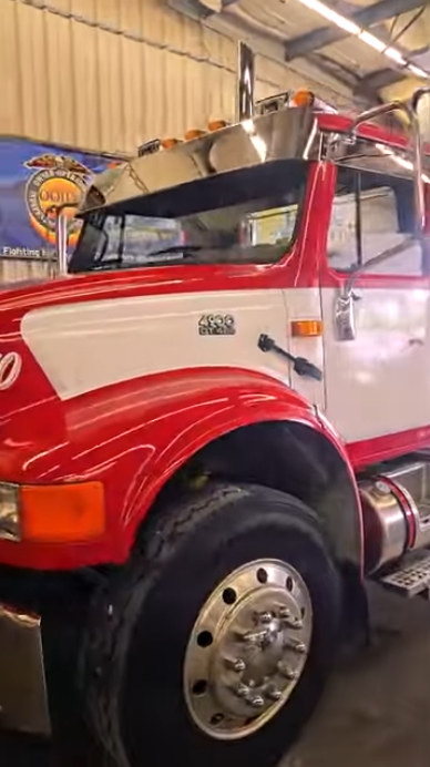 #4900 International day cab truck customized by 4 State Trucks featuring a unique custom visor for WC Gray Farms