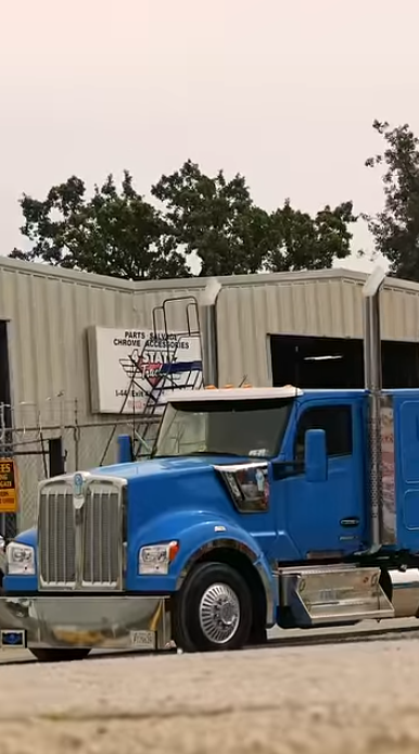 Kenworth W990 truck close-up showcasing custom work and detailing recently completed by 4 State Trucks