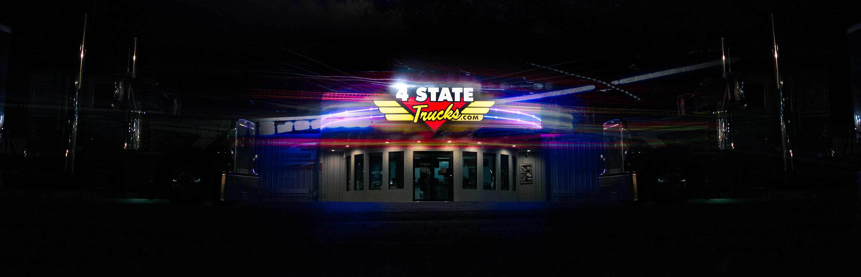 4 State Trucks Brick and Mortar Store in Joplin, Missouri at Night