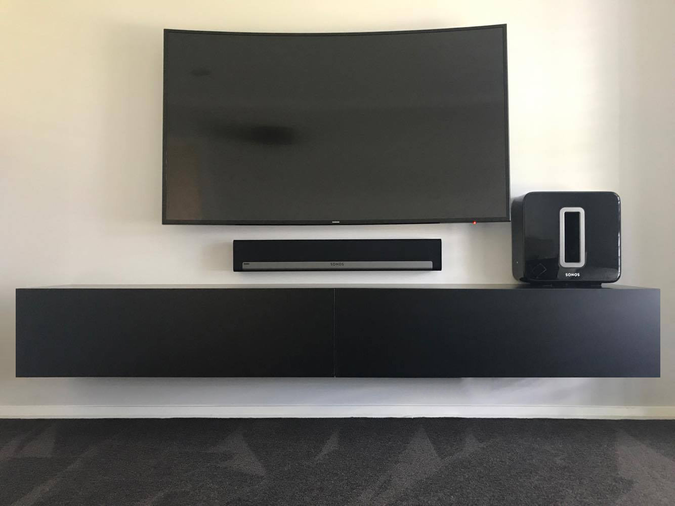 black-floating-tv-entertainement-wall-mounted-unit.jpg