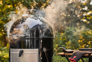 What is the difference between a Weber Kettle and Smokey Mountain?