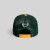 NO F*CKS GIVEN FLAMETOOTH EMERALD ATHLETIC GOLD TWILL MESH TRUCKER