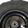 Mini XRX Plus & Mini XRX-R Plus Left Front Wheel & Tire Assembly 145/70-6, close-up of the black tire sidewall marked 145/70-6 and glossy wheel hub with center bearing.