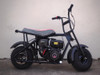 TrailMaster Storm 200 MiniBike, black electric mini motorcycle with thick tires and a compact design.