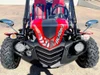 TrailMaster Blazer 200 EX Go Kart, full front view showing roll cage, electric start, and reverse feature, with red and black body design and large off-road tires