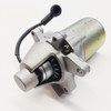 TrailMaster Cheetah 8 Go Kart Starter Motor, close-up view of the metallic starter motor with attached wiring and gear mechanisms.
