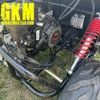 TrailMaster Mid XRX-R Go Kart For Kids with Reverse, Electric Start, 5 Point Harness, close-up of engine and suspension.