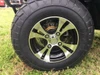 Trailmaster Taurus 200U Utility SXS UTV, close-up of the vehicle's tire and alloy wheel on a grassy surface.