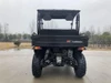 Trailmaster Taurus 200U, utility SXS UTV, front view of the black off-road utility vehicle with large tires and suspension system.