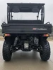 Trailmaster Taurus 200U Utility SXS UTV, front view showing off-road tires, suspension, and cargo bed.
