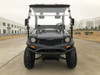 Trailmaster Taurus 200U Utility SXS UTV, front view of the rugged all-terrain utility vehicle with large off-road tires, windscreen, and utility features.