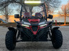 TrailMaster Cheetah 300EX Deluxe EFI Go-Kart/UTV Crossover, front view of a red and black off-road vehicle with LED headlights, large tires, and a protective roll cage.