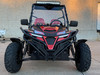 TrailMaster Cheetah 300EX Deluxe EFI Go-Kart/UTV Crossover, front view of rugged off-road vehicle with large tires, black and red body, LED light bar on top, and protective bumper.