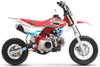 TrailMaster SK110A 110cc Fully Automatic Kids Dirt Bike, red and white off-road motorcycle with rugged tires and Yamaha-inspired design.