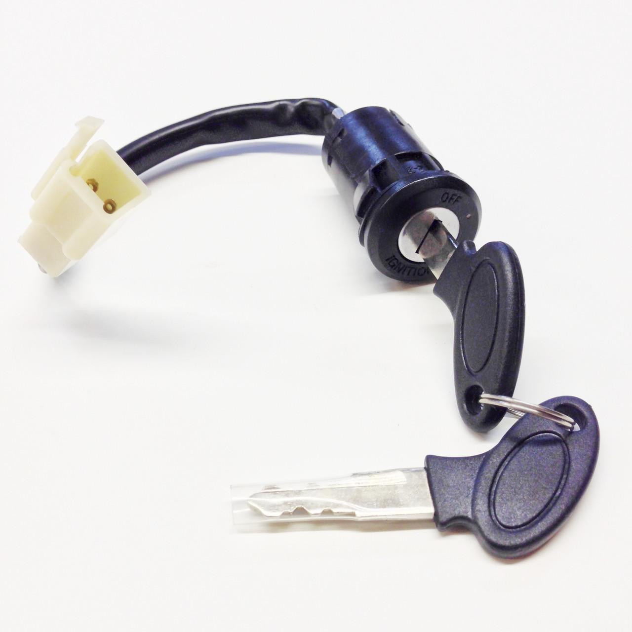 TrailMaster Mini XRX+/XRX-R+ Ignition Key Switch, black ignition switch with key, wiring harness, and two keys laid out on a white background.