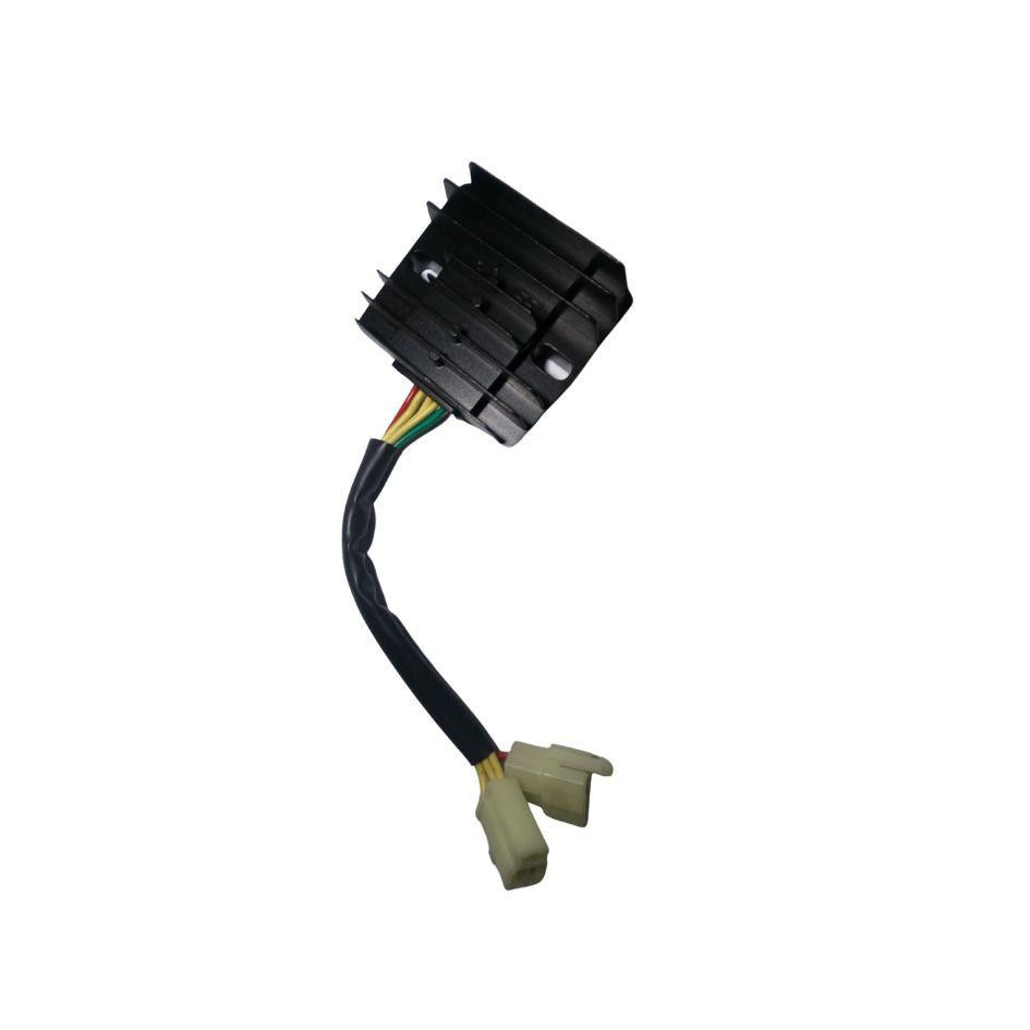 Trailmaster 200 go kart EFI Regulator Rectifier, a black electrical component with multiple cooling fins and connected wires with connectors.