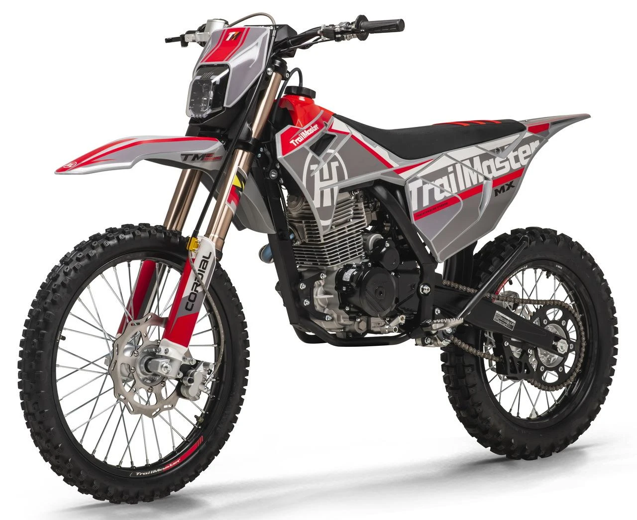 Trailmaster MX250 Pro Dirt Bike, a modern off-road motorcycle with a red, grey, and black color scheme, 35.5-inch seat height, featuring manual, electric, and kick start options, suitable for off-road riding.