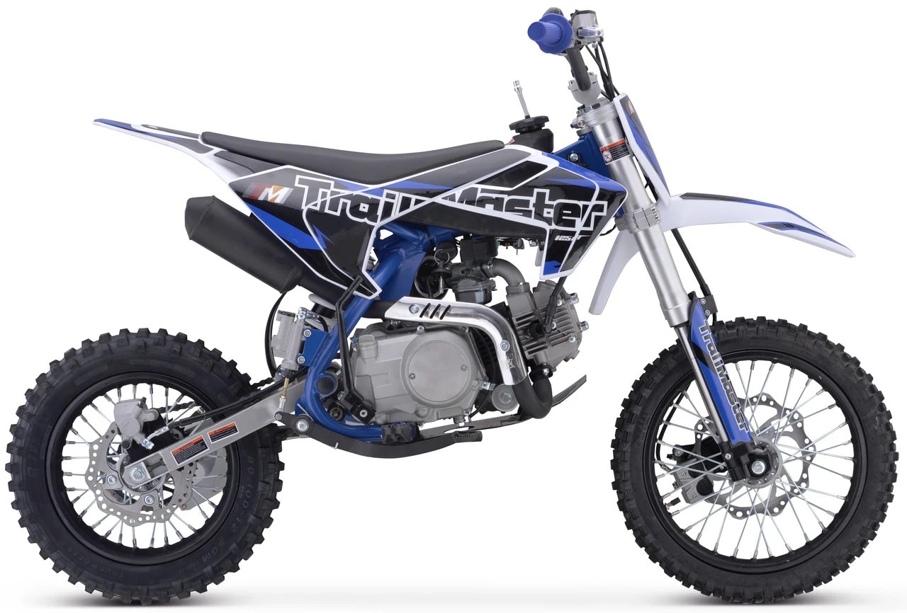 Trailmaster TM23 Youth Dirt Bike 29" Seat, electric start, semi-automatic transmission, blue and white color with black accents, rugged off-road tires, and a compact design for young riders.