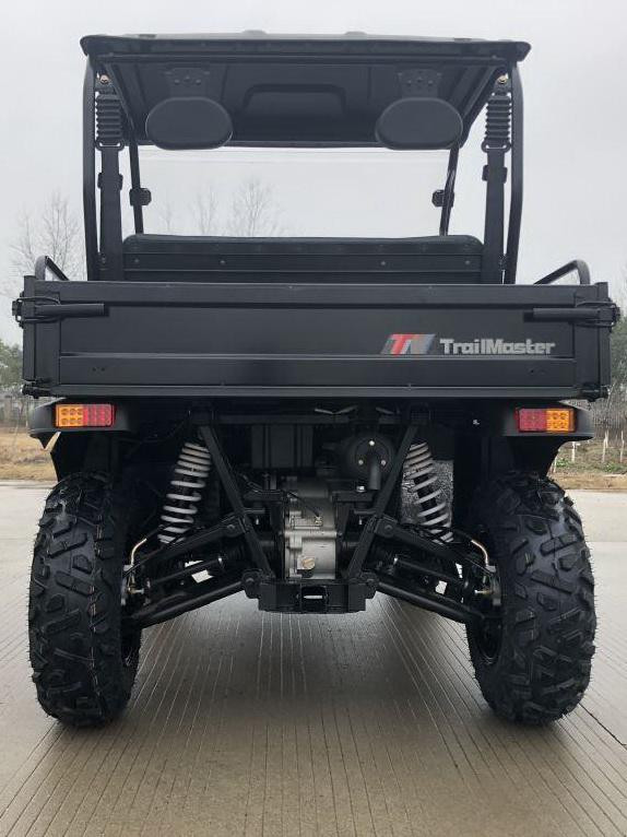 Trailmaster Taurus 200U Utility SXS UTV, front view showing off-road tires, suspension, and cargo bed.