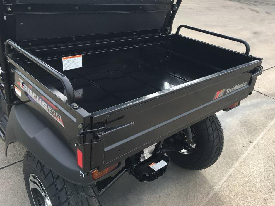 Trailmaster Taurus 200U Utility SXS UTV, cargo bed with black finish and safety rails for off-road utility tasks.