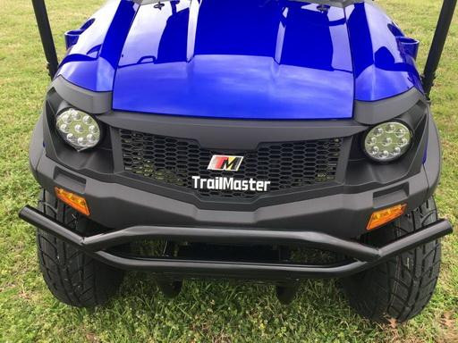 Trailmaster Taurus 200U Utility SXS UTV, front view of blue and black off-road vehicle with LED headlights and rugged tires, ideal for outdoor utility and recreational use.