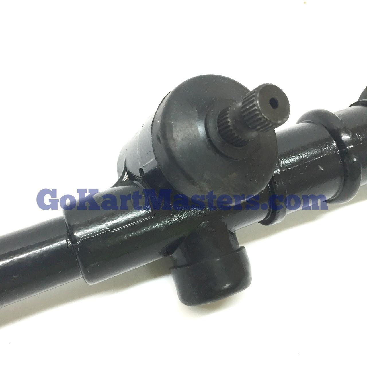 Trailmaster 200 XRS & 200 XRX Steering Box Assembly with tie rod ends, black metal steering component with gear and tie rod elements.