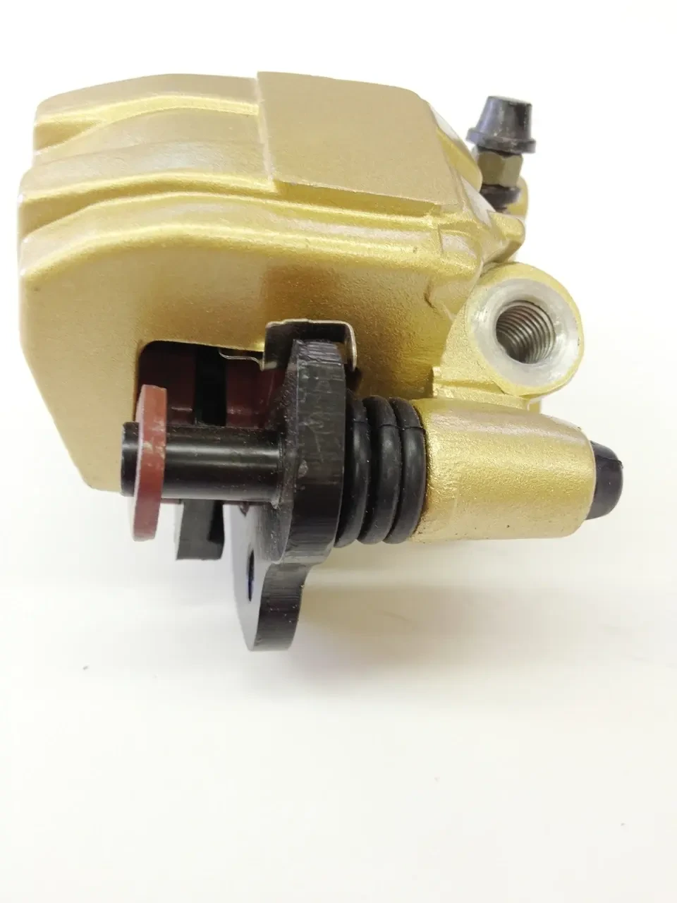 TrailMaster 200 XRS Front Brake Caliper Set, gold-colored brake caliper with black mounting bracket and rubber boot, used for ATV or dirt bike braking system.