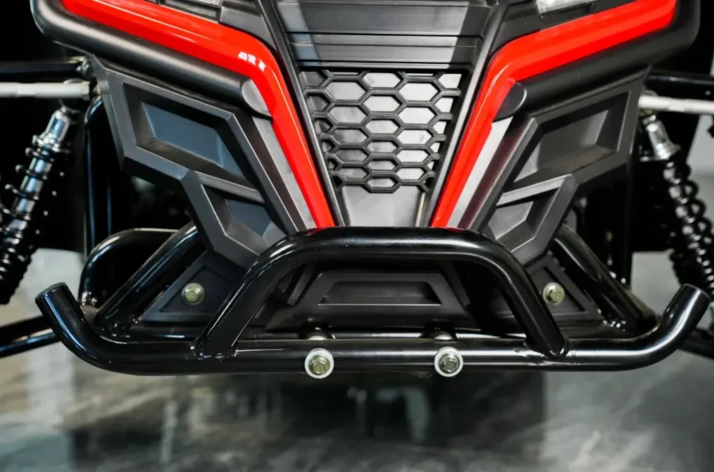 TrailMaster Cheetah 6 Decorative parts(L), front view of the black and red motorcycle bumper with decorative components.