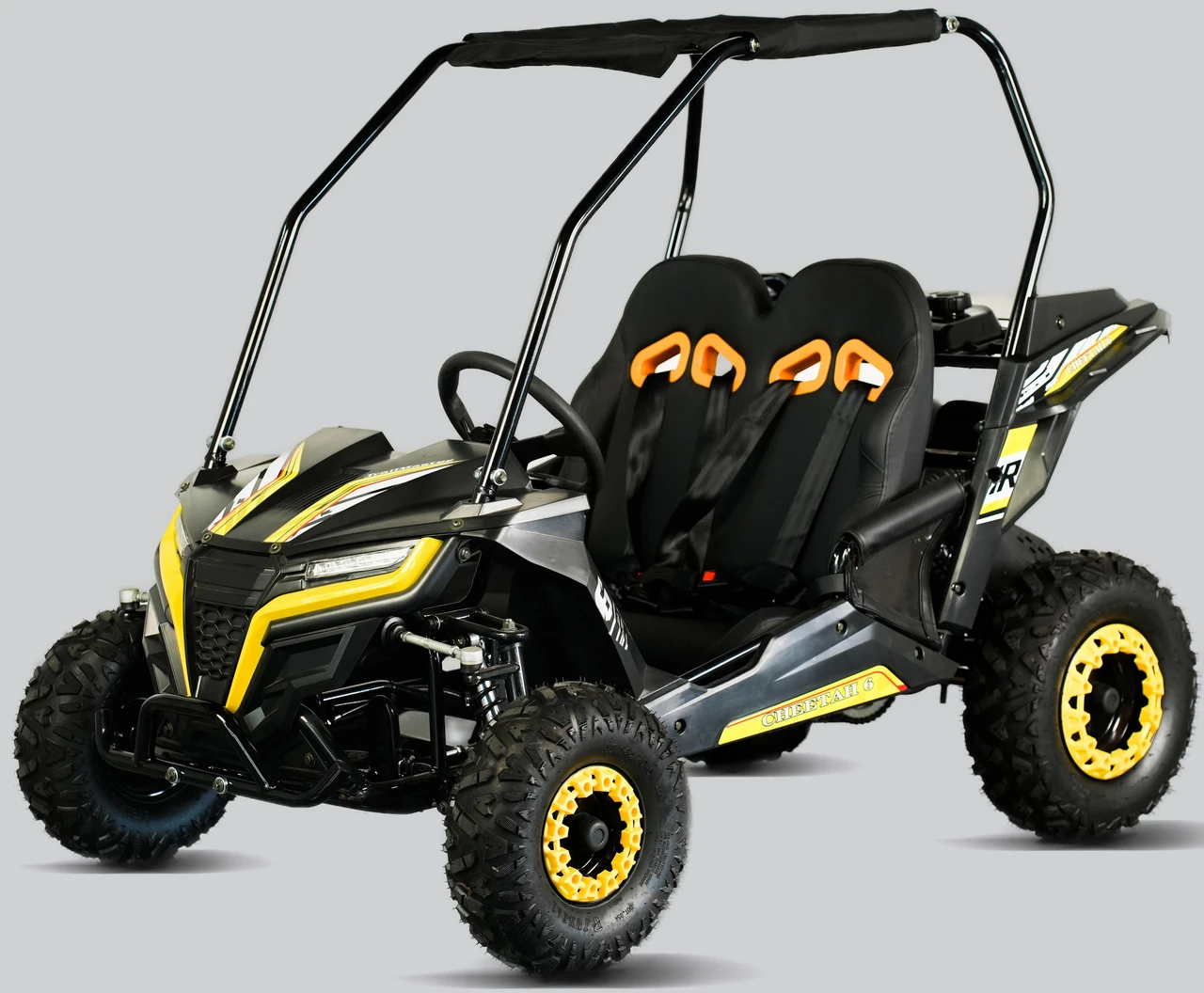TrailMaster Cheetah 6 Youth Go-Kart, a rugged off-road electric go-kart with black and yellow accents, dual black seats with orange harnesses, large off-road tires, and a protective frame.