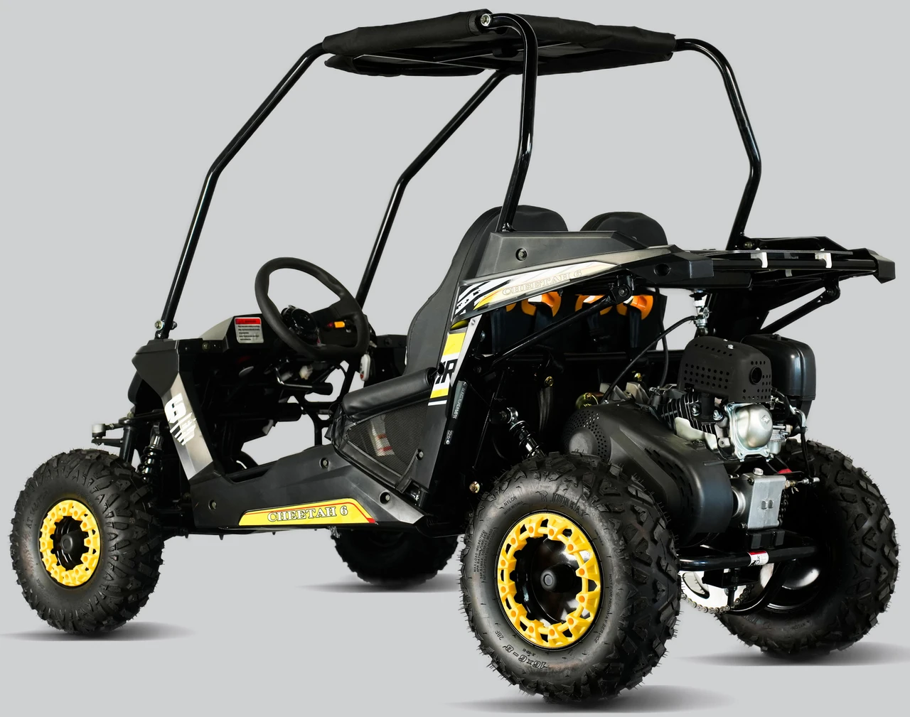 TrailMaster Cheetah 6 Youth Go-Kart, black and yellow off-road go-kart with a sturdy frame, four large rugged tires, and a small engine for young drivers.