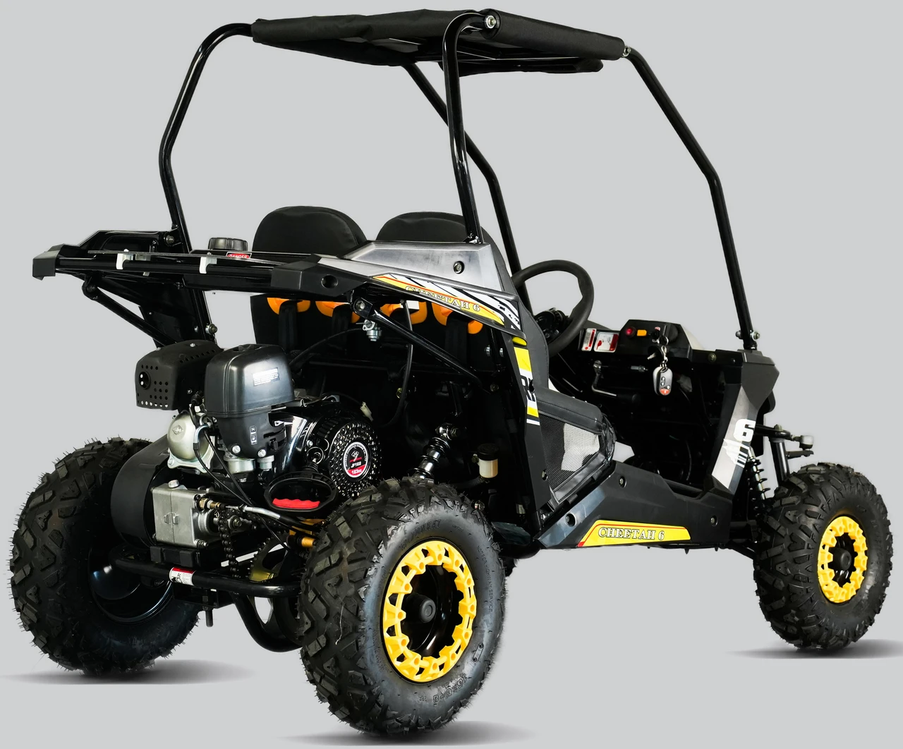 TrailMaster Cheetah 6 Youth Go-Kart, rugged off-road black and yellow go-kart with a sturdy frame, large tires, and a small engine suitable for young drivers.