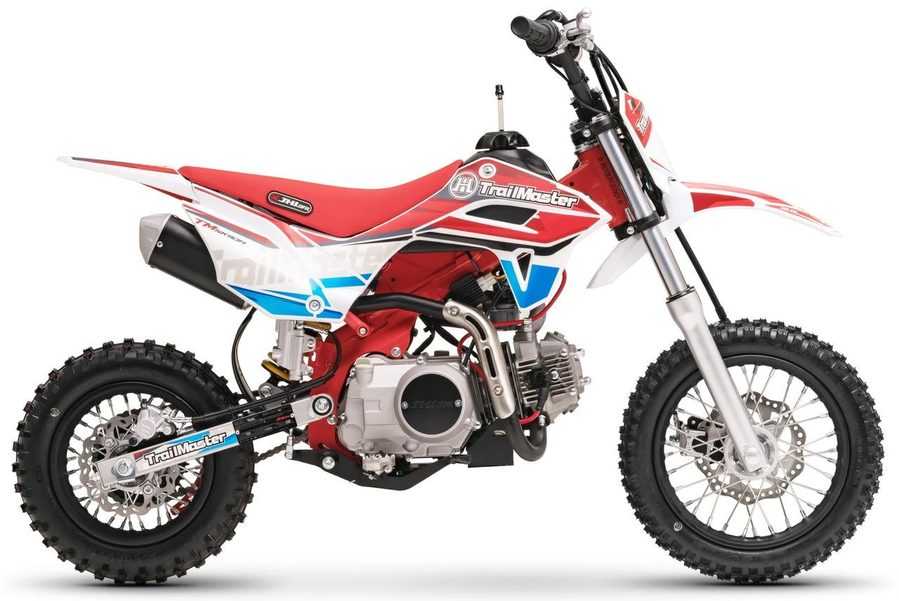 TrailMaster SK110A 110cc Fully Automatic Kids Dirt Bike, red and white off-road motorcycle with rugged tires and Yamaha-inspired design.