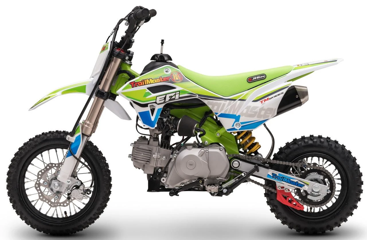 TrailMaster SK110S 110cc Semi-Automatic Kids Dirt Bike, green and white motorcycle with knobby tires and shock absorbers.