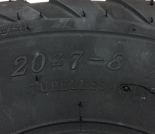 TrailMaster 300 XRX & 300 XRS Front Tire, close-up of the black tire sidewall showing the 20x7-8 size and tubeless marking.