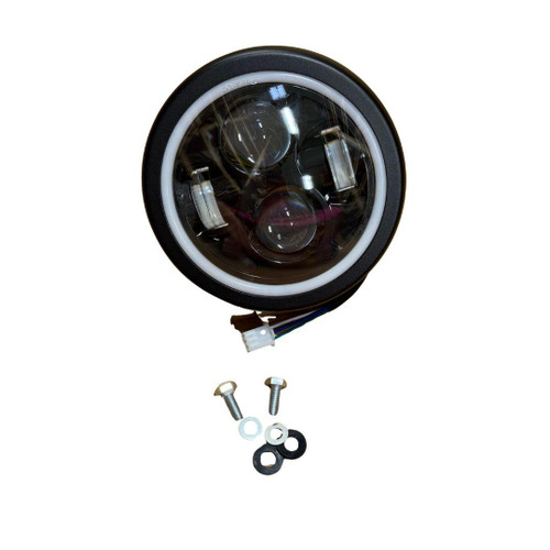 TrailMaster Hurricane 200X and 200X Pro Headlight Assembly, round LED headlight with multiple internal reflectors and a wiring connector, accompanied by mounting screws and washers.