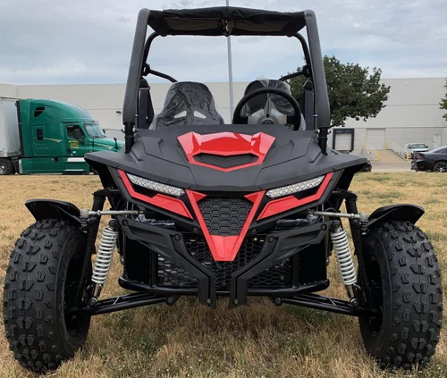 TrailMaster Cheetah 200E EFI Go-Kart/UTV Crossover, front view of the black and red off-road vehicle with rugged tires and suspension.