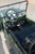 TM Army Vehicle Jeep-style ATAC GK-6125A, interior view of the electric golf cart with steering wheel, dashboard, and seating area.