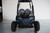 TM Cheetah i6 Battery powered, front view of an off-road electric vehicle with black and blue accents and rugged tires.