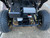 TM Cheetah i6 Battery Powered, close-up view of the electric vehicle's battery pack and motor system.