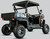 TM Challenger 200 EUX | YOUTH SXS | EFI | Utility Bed | Premium Package, all-terrain utility vehicle with black frame, large rugged tires, utility bed at the back, and a protective roof.