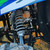 TM Challenger 200 EUX, Youth SXS with EFI, Utility Bed, and Premium Package - close-up view of the suspension system and engine components.