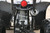 TM 3050c Mini 110cc ATV, front view of the mini all-terrain vehicle showcasing the suspension system, engine components, and rugged tires.
