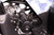 TM 3125R ATV, close-up view of engine and mechanical components inside the ATV's chassis.