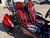 TMBlazer 200EX PREMIUM Sport Go Kart, red and black racing seats with safety belts inside a rugged frame.