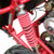 TM Mid XRX Go Kart for age 8 and up, close-up of the red shock absorber and part of the mechanical structure.