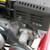 TM Mid XRX Go Kart for age 8 and up, close-up view of the engine and cooling system components.